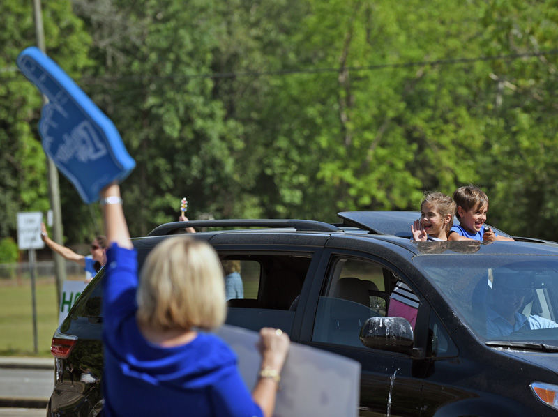 Teachers hold parade for students at Houston Academy